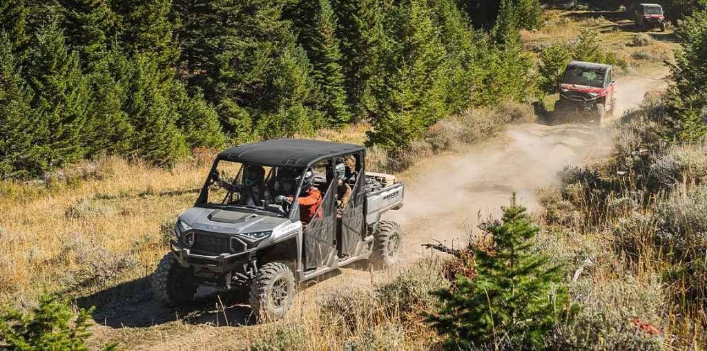 Ranger XD 1500 UTVs on a dusty road